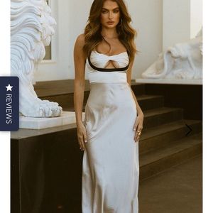 Brand new with tags size medium dress from runaway the label